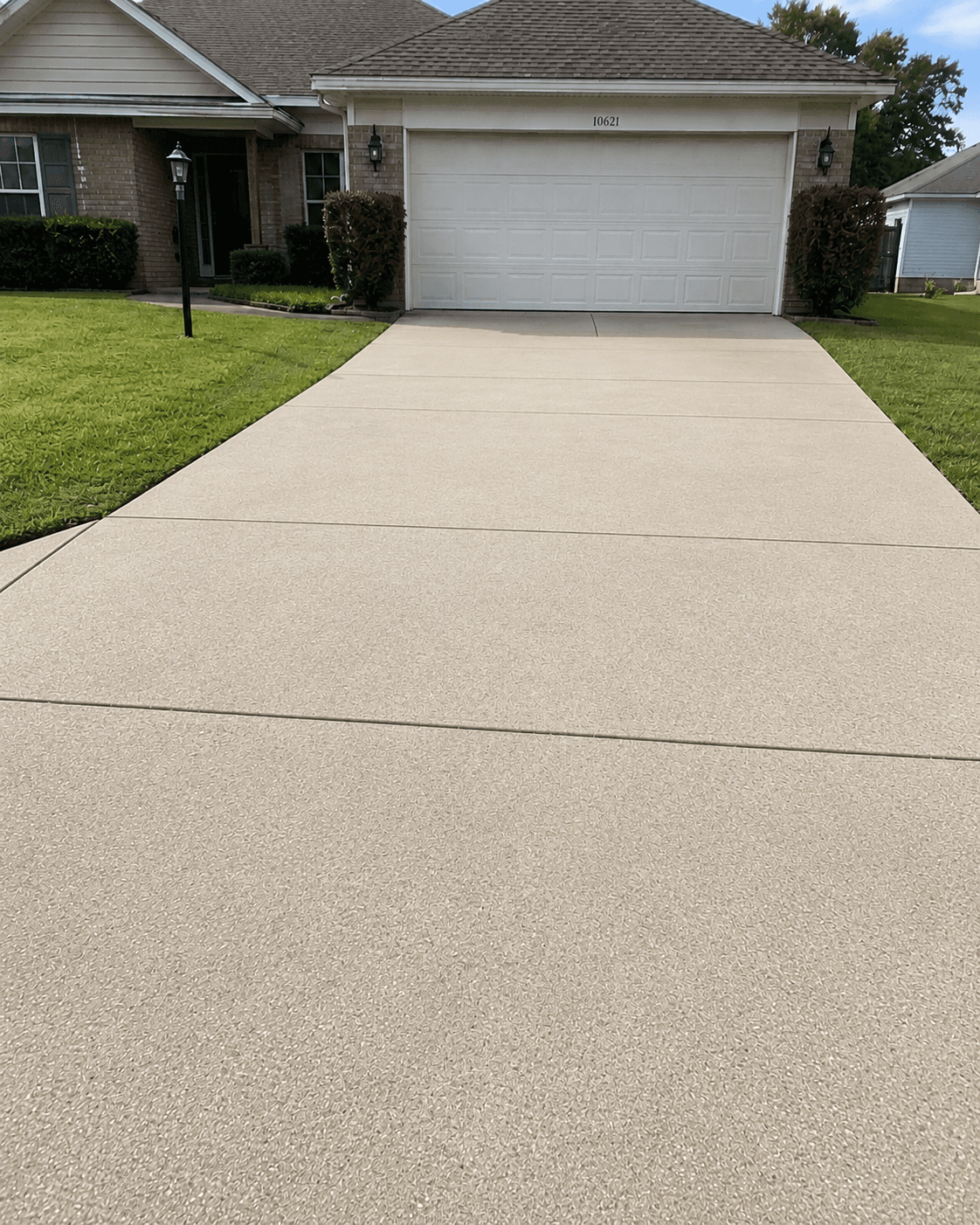 Clean driveway after pressure washing